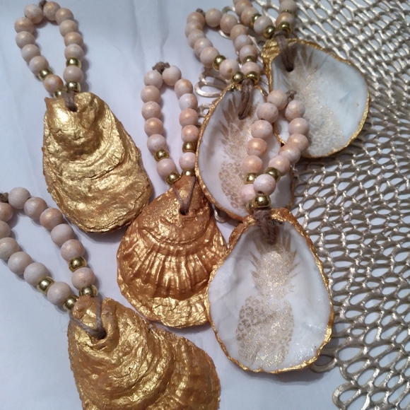 Set of 6. Natural Oyster Shell Napkin Rings - Picture 4 of 4